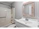 Bathroom showcasing a shower-tub combo and a vanity with a mirror at 4318 Hunters Club Dr, Raleigh, NC 27606