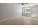 Bright bedroom with neutral walls, tile flooring, and a view to the outside at 4318 Hunters Club Dr, Raleigh, NC 27606
