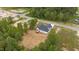 Birds eye view shows new house with a back porch and an expansive yard with road nearby at 45 Leisure Ln # 4, Louisburg, NC 27549