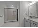 Bright bathroom features glass shower, granite countertops, modern fixtures, and neutral color palette at 45 Leisure Ln # 4, Louisburg, NC 27549