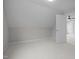 Bright bedroom with a ceiling light and an open doorway to a neighboring room at 45 Leisure Ln # 4, Louisburg, NC 27549