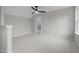 Bright bedroom with a ceiling fan and a view of the neighborhood at 45 Leisure Ln # 4, Louisburg, NC 27549