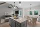 Well-appointed kitchen featuring an island, stainless appliances, and an adjoining dining area at 45 Leisure Ln # 4, Louisburg, NC 27549