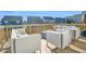Inviting backyard deck featuring modern seating area with a contemporary fire pit perfect for entertaining at 4816 Heathshire Dr, Raleigh, NC 27616