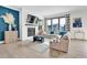 Cozy living room with a fireplace, comfortable seating, and stylish decor, creating a relaxing atmosphere at 4816 Heathshire Dr, Raleigh, NC 27616