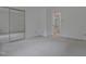 Spacious bedroom featuring neutral carpeting and a large mirrored closet at 497 Summerwalk Cir # 497, Chapel Hill, NC 27517