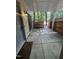 Covered patio area with stone flooring and a fenced-in yard at 497 Summerwalk Cir # 497, Chapel Hill, NC 27517