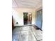 Outdoor patio area featuring a sliding glass door and an exterior access door at 497 Summerwalk Cir # 497, Chapel Hill, NC 27517