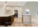 Stylish kitchen with white cabinetry, stainless steel appliances, and a spacious island at 5516 Jaeger Dr # 75, Graham, NC 27253
