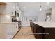 Modern kitchen featuring white cabinets, stainless steel appliances, and a large island at 5516 Jaeger Dr # 75, Graham, NC 27253