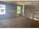 Unfinished room with visible drywall, framed windows overlooking greenery, and construction elements at 5516 Jaeger Dr # 75, Graham, NC 27253