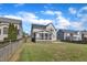 Large backyard features green grass, fenced perimeter, and a screened porch for outdoor living at 602 Alden Bridge Dr, Cary, NC 27519