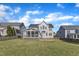Expansive backyard with green grass and fenced perimeter offers plenty of space for recreation at 602 Alden Bridge Dr, Cary, NC 27519