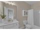 Functional bathroom with sink, toilet, vanity with mirror, and shower with tub at 602 Alden Bridge Dr, Cary, NC 27519