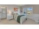 Stylishly decorated bedroom featuring a comfortable bed, chandelier, and bright natural light at 602 Alden Bridge Dr, Cary, NC 27519