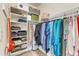 Spacious walk-in closet features custom shelving and organized clothing racks at 602 Alden Bridge Dr, Cary, NC 27519