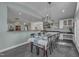 Dining room area with view to the wet bar and living spaces at 602 Alden Bridge Dr, Cary, NC 27519