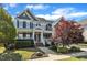 Charming two-story home with landscaped yard, covered porch, and beautiful curb appeal at 602 Alden Bridge Dr, Cary, NC 27519