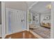 Bright foyer with hardwood floors and an open view to the living room at 602 Alden Bridge Dr, Cary, NC 27519