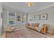 Comfortable living room with modern decor and ample natural light from the windows at 602 Alden Bridge Dr, Cary, NC 27519