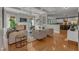 Cozy living room with a fireplace, coffered ceilings, and stylish decor, perfect for relaxation at 602 Alden Bridge Dr, Cary, NC 27519