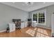 Bright and airy office space featuring a large window and built-in desks for productivity at 602 Alden Bridge Dr, Cary, NC 27519