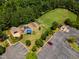 Aerial view of a well-equipped community playground featuring slides, swings, climbing structures and parking at 602 Alden Bridge Dr, Cary, NC 27519