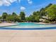 View of the community pool featuring a zero entry wading area and waterslide at 602 Alden Bridge Dr, Cary, NC 27519