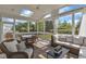 Inviting screened porch featuring stylish furniture, offering a cozy and relaxing outdoor retreat at 602 Alden Bridge Dr, Cary, NC 27519