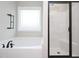 Modern bathroom with a soaking tub, glass door shower, and tiled floors at 63 Whistling Duck Way, Wendell, NC 27591