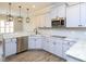 Well-designed kitchen with granite countertops, stainless steel appliances, and lots of cabinet space at 63 Whistling Duck Way, Wendell, NC 27591