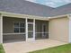 A screened-in porch offers great natural light and easy outdoor access at 63 Whistling Duck Way, Wendell, NC 27591