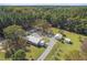 Aerial view of home, large lot, detached garage and storage building at 6418 Beaver Creek Rd, New Hill, NC 27562