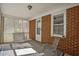 Covered porch area showcasing brick wall and lattice detail at 6418 Beaver Creek Rd, New Hill, NC 27562