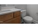 Cozy bathroom features a modern vanity with a white countertop and a toilet with neutral wall paint at 65 Leisure Ln # 6, Louisburg, NC 27549