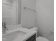 Well-lit bathroom featuring a modern vanity with chrome fixtures and a toilet at 65 Leisure Ln # 6, Louisburg, NC 27549