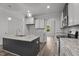 The new kitchen offers stainless steel appliances, granite countertops, and an island with a sink at 65 Leisure Ln # 6, Louisburg, NC 27549