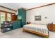 Spacious bedroom with a bed, built in shelves and drawers, and natural light at 6600 Maynard Farm Rd, Chapel Hill, NC 27516