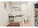 Clean bathroom features a vanity with a stool, a toilet and a handrail for extra safety at 6600(A) Maynard Farm Rd, Chapel Hill, NC 27516