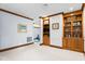 Bonus room with TV, bookcase, and exercise area in the background at 6600(A) Maynard Farm Rd, Chapel Hill, NC 27516