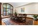 Formal dining room with hardwood floors, large window, and elegant decor at 6600(A) Maynard Farm Rd, Chapel Hill, NC 27516