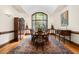 Formal dining room with hardwood floors, large window, and elegant decor at 6600(A) Maynard Farm Rd, Chapel Hill, NC 27516