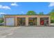 Metal garage featuring three open doors and a parked vehicle at 6600(A) Maynard Farm Rd, Chapel Hill, NC 27516
