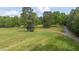 Scenic land featuring lush pastures, mature trees, and a gravel path at 6600(A) Maynard Farm Rd, Chapel Hill, NC 27516