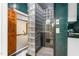 Shower boasts glass-block walls, a rain shower head and a towel bar for convenience at 6600(A) Maynard Farm Rd, Chapel Hill, NC 27516