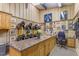 View of the tack room featuring cabinets, sink, and wall decor at 6600(A) Maynard Farm Rd, Chapel Hill, NC 27516