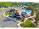 Aerial view of clubhouse, pool, parking and outdoor amenities at this exceptional community at 67 Comfort Ct, Fuquay Varina, NC 27526