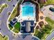 A bird's eye view of the community pool, clubhouse and park, set among beautiful homes at 67 Comfort Ct, Fuquay Varina, NC 27526