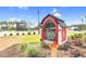A cozy lending library offers a variety of books and is another way neighbors connect at 67 Comfort Ct, Fuquay Varina, NC 27526