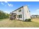 Charming home exterior with screened-in porch and well-maintained backyard space at 67 Comfort Ct, Fuquay Varina, NC 27526